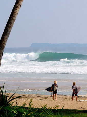 simeulue surf camp resort grunts on beach looking for a wave